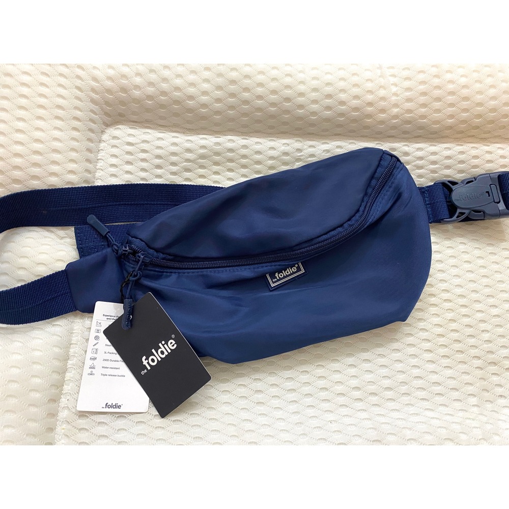 The Foldie Anti-Theft Crossbody Bag Navy Blue Water Resistant RFID Travel Pack